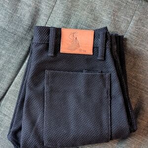 Black Textured Pants with Logo Patch